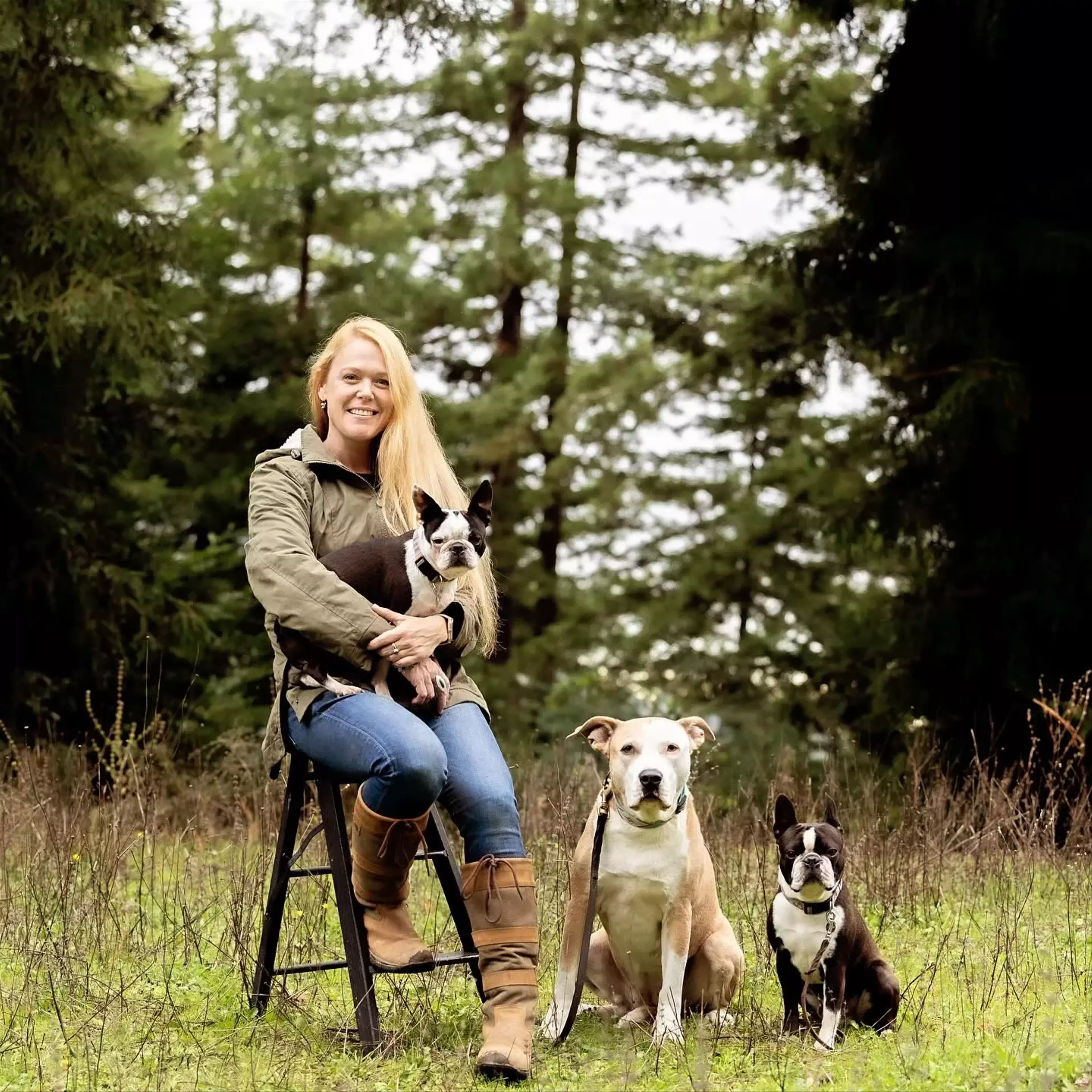 Janna with her pets, Levi, Rose, Daisy, and Bling the horse.